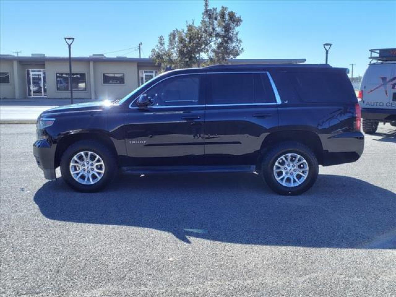 2015 Black Chevrolet Tahoe LT (1GNSCBKC9FR) with an 5.3L EcoTec3 5.3L Flex Fuel V8 Direct Injection engine, 6-Speed Shiftable Automatic w/Overdrive transmission, located at 1401 N. Hobart, Pampa, TX, 79065, (806) 665-9872, 35.549641, -100.971878 - Photo #4