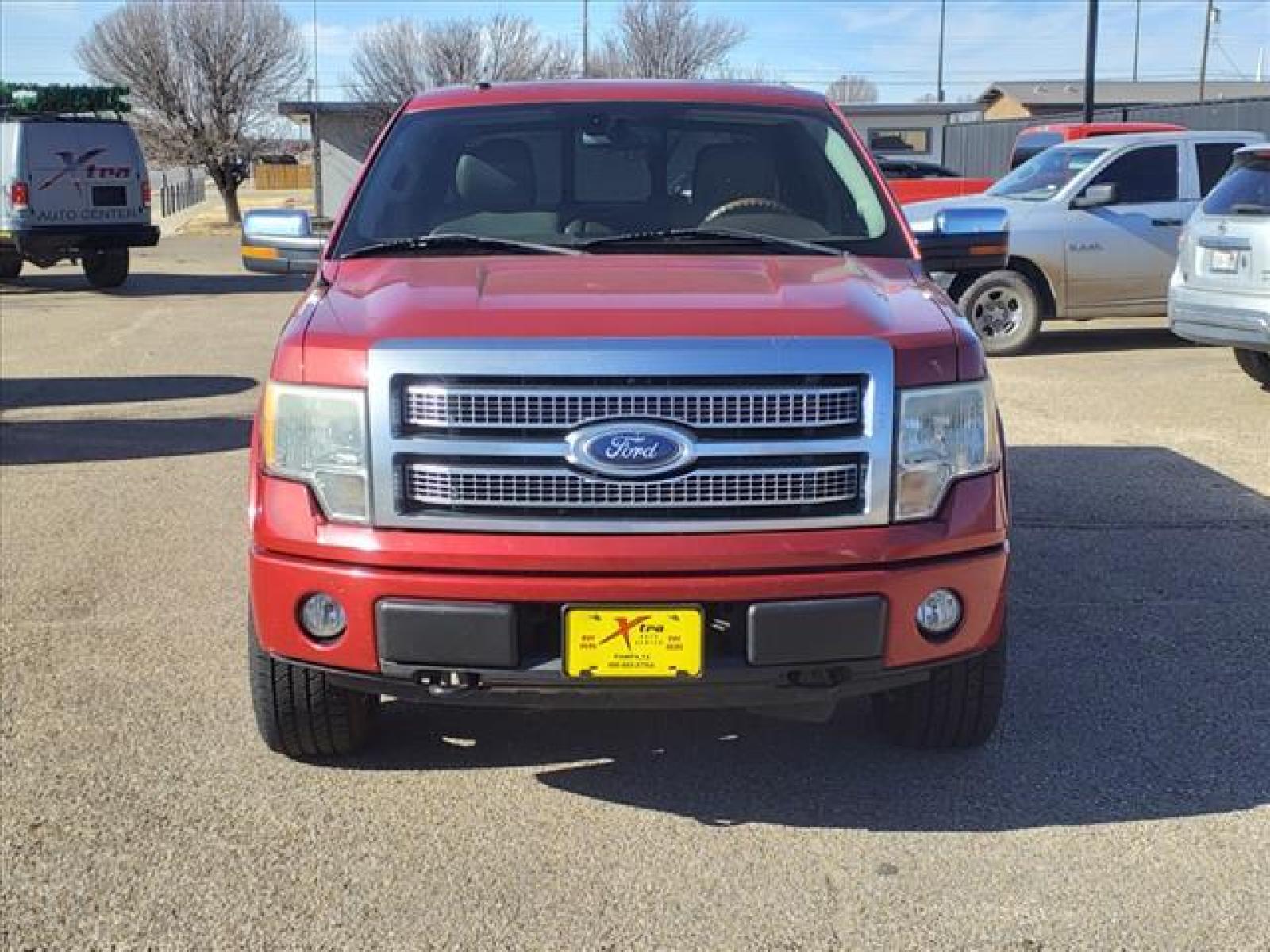 2010 Red Candy Metallic Ford F-150 Platinum (1FTFW1EV1AF) with an 5.4L Triton 5.4L Flex Fuel V8 Sequential Multiport Fuel Injection engine, 6-Speed Automatic transmission, located at 1401 N. Hobart, Pampa, TX, 79065, (806) 665-9872, 35.549641, -100.971878 - Photo #1