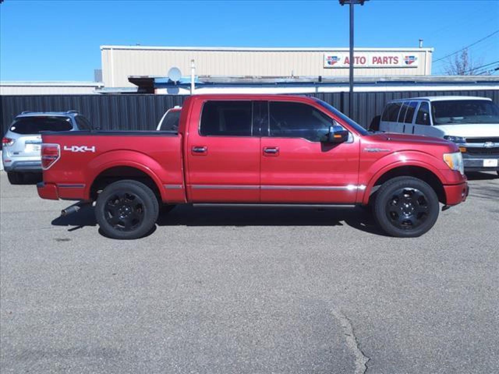 2010 Red Candy Metallic Ford F-150 Platinum (1FTFW1EV1AF) with an 5.4L Triton 5.4L Flex Fuel V8 Sequential Multiport Fuel Injection engine, 6-Speed Automatic transmission, located at 1401 N. Hobart, Pampa, TX, 79065, (806) 665-9872, 35.549641, -100.971878 - Photo #2