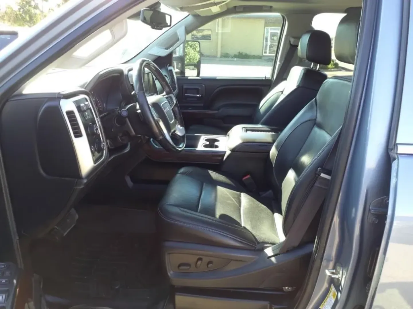 2016 Light Steel Gray Metallic GMC Sierra 3500HD SLT Crew Cab 4WD (1GT12TE85GF) with an Other engine, located at 1401 N. Hobart, Pampa, TX, 79065, (806) 665-9872, 35.549953, -100.975098 - **Elevate Your Adventure with the 2016 GMC Sierra 3500HD SLT Crew Cab 4WD Available Now at Xtra Auto Center in Pampa, TX!**<br /> <br /> Looking for a dependable vehicle that can handle your weekend adventures or serve as a reliable workhorse during the week? The 2016 GMC Sierra 3500HD SLT Crew Cab - Photo#10