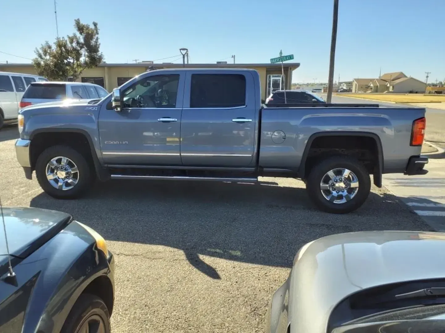 2016 Light Steel Gray Metallic GMC Sierra 3500HD SLT Crew Cab 4WD (1GT12TE85GF) with an Other engine, located at 1401 N. Hobart, Pampa, TX, 79065, (806) 665-9872, 35.549953, -100.975098 - **Elevate Your Adventure with the 2016 GMC Sierra 3500HD SLT Crew Cab 4WD Available Now at Xtra Auto Center in Pampa, TX!**<br /> <br /> Looking for a dependable vehicle that can handle your weekend adventures or serve as a reliable workhorse during the week? The 2016 GMC Sierra 3500HD SLT Crew Cab - Photo#4