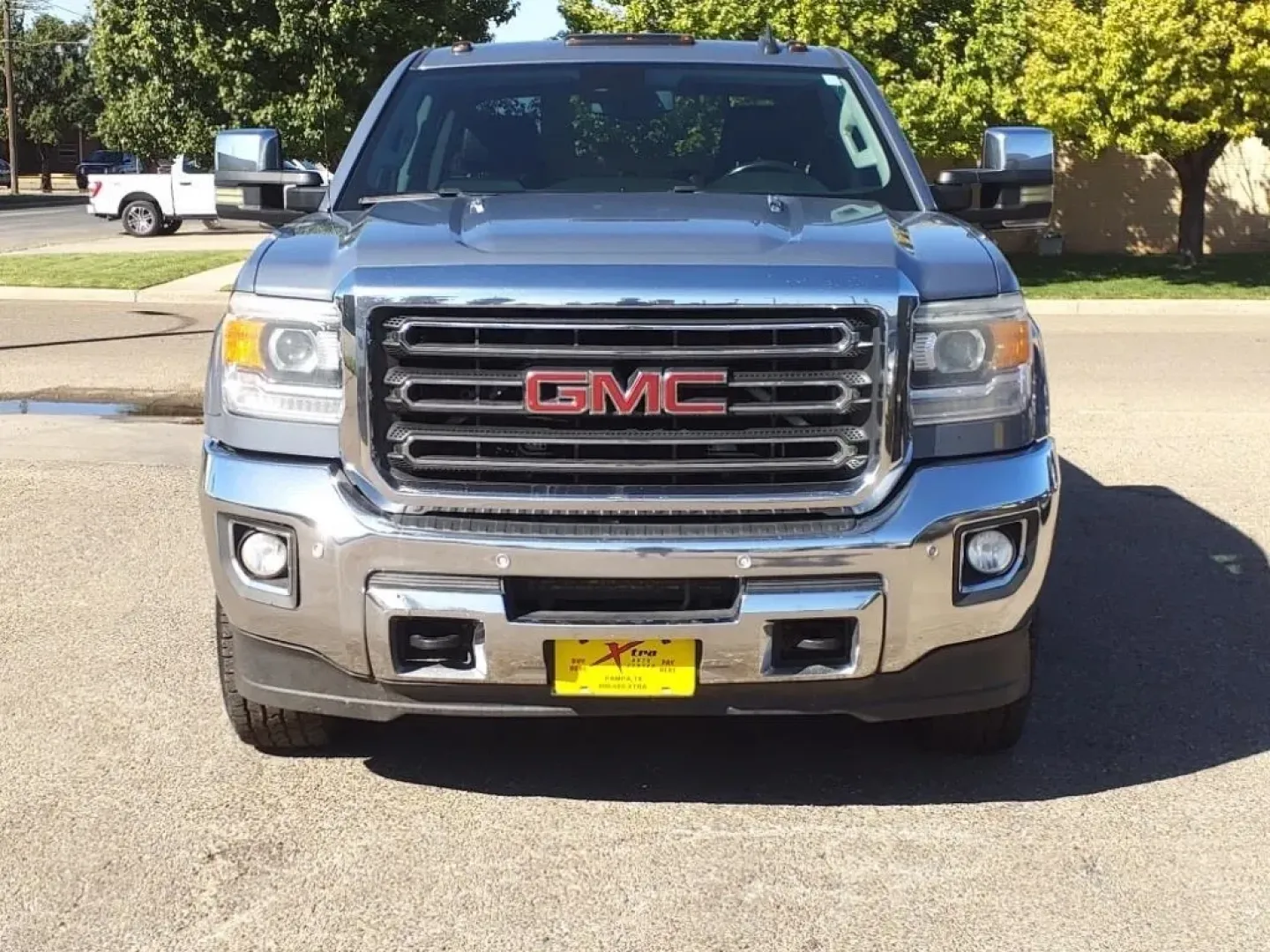 2016 Light Steel Gray Metallic GMC Sierra 3500HD SLT Crew Cab 4WD (1GT12TE85GF) with an Other engine, located at 1401 N. Hobart, Pampa, TX, 79065, (806) 665-9872, 35.549953, -100.975098 - **Elevate Your Adventure with the 2016 GMC Sierra 3500HD SLT Crew Cab 4WD Available Now at Xtra Auto Center in Pampa, TX!**<br /> <br /> Looking for a dependable vehicle that can handle your weekend adventures or serve as a reliable workhorse during the week? The 2016 GMC Sierra 3500HD SLT Crew Cab - Photo#1