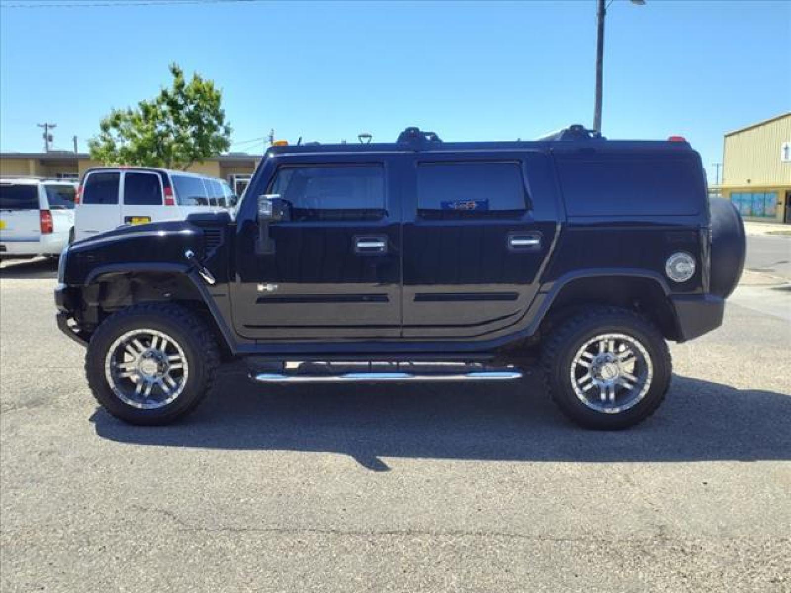 2006 Black HUMMER H2 Base (5GRGN23U86H) with an 6.0L 6.0L NA V8 overhead valve Fuel Injected engine, 4-Speed Automatic transmission, located at 1401 N. Hobart, Pampa, TX, 79065, (806) 665-9872, 35.549641, -100.971878 - Photo #4