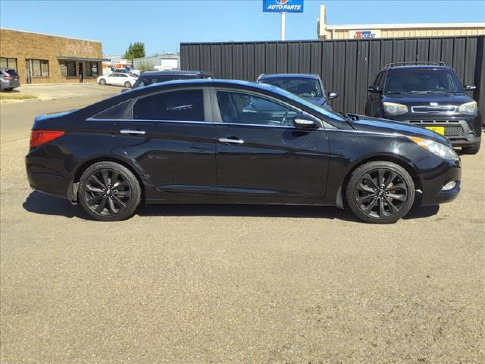 2011 Black Hyundai Sonata Limited 2.0T (5NPEC4AB3BH) with an 2.0L Theta II 2L Turbo I4 274h Direct Injection engine, 6-Speed Shiftable Automatic transmission, located at 1401 N. Hobart, Pampa, TX, 79065, (806) 665-9872, 35.549641, -100.971878 - Photo #2