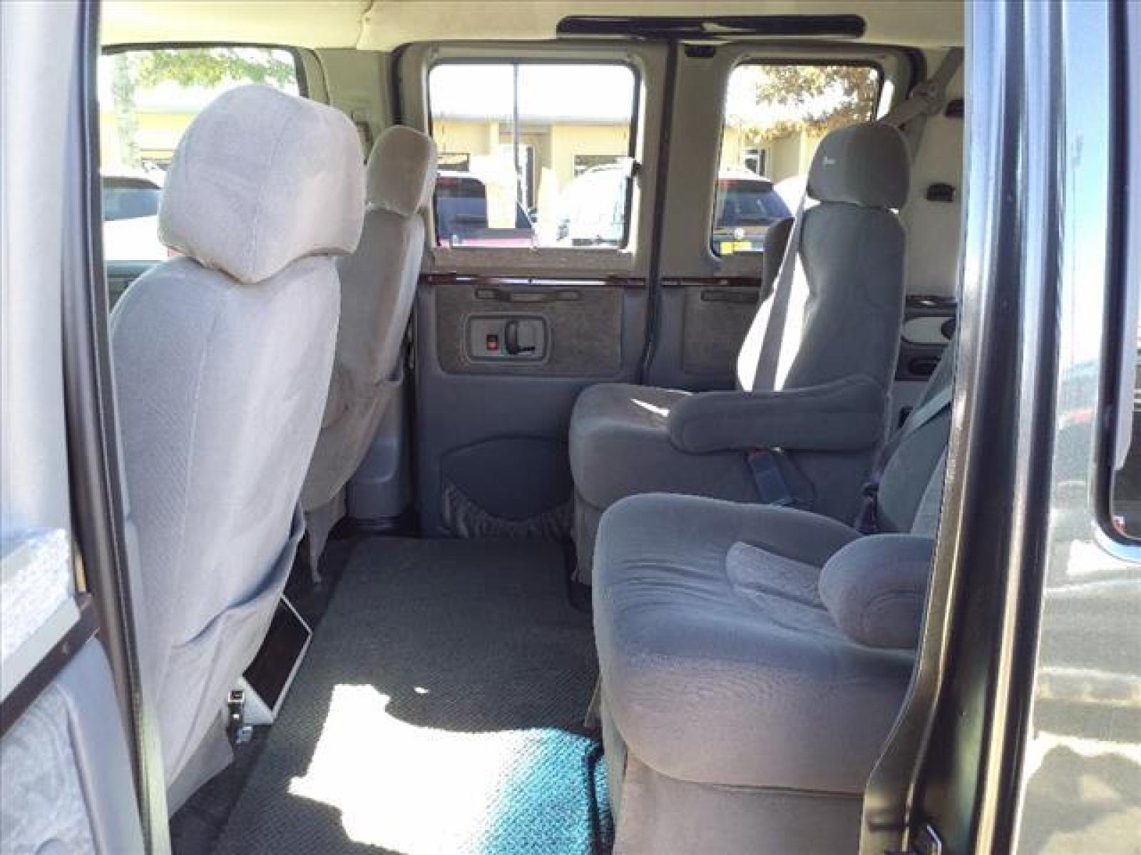 2003 Dk. Gray GMC Savana Passenger 1500 (1GDFG15T131) with an 5.3L 5.3L V8 OHV 16V FI Engine Fuel Injection engine, 4-Speed Automatic transmission, located at 1401 N. Hobart, Pampa, TX, 79065, (806) 665-9872, 35.549641, -100.971878 - Photo #19