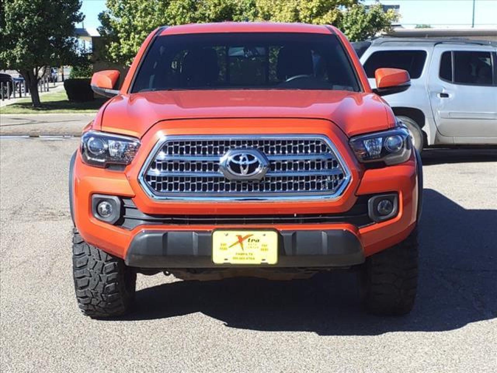 2016 Inferno Toyota Tacoma TRD Off-Road (5TFSZ5AN0GX) with an 3.5L 3.5L V6 278hp 265ft. lbs. Direct Injection engine, 6-Speed Shiftable Automatic transmission, located at 1401 N. Hobart, Pampa, TX, 79065, (806) 665-9872, 35.549641, -100.971878 - Photo #1