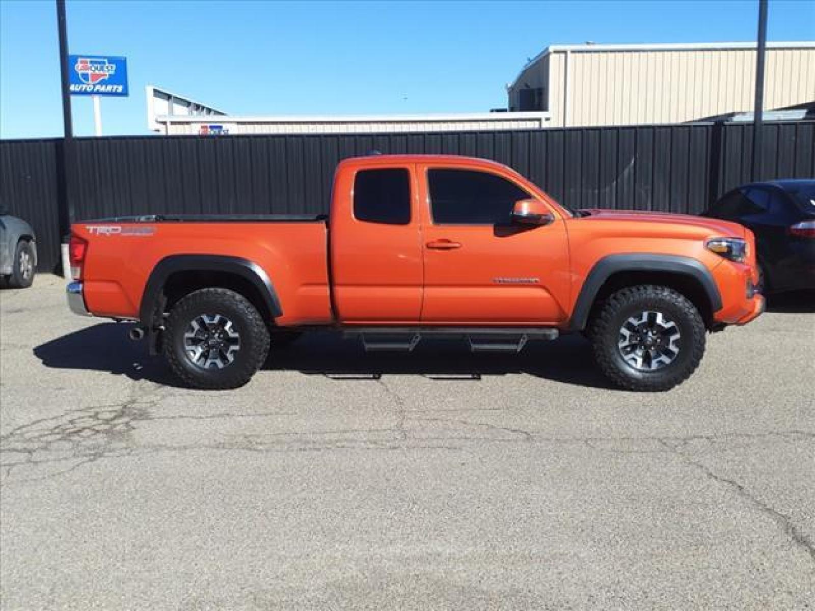 2016 Inferno Toyota Tacoma TRD Off-Road (5TFSZ5AN0GX) with an 3.5L 3.5L V6 278hp 265ft. lbs. Direct Injection engine, 6-Speed Shiftable Automatic transmission, located at 1401 N. Hobart, Pampa, TX, 79065, (806) 665-9872, 35.549641, -100.971878 - Photo #2