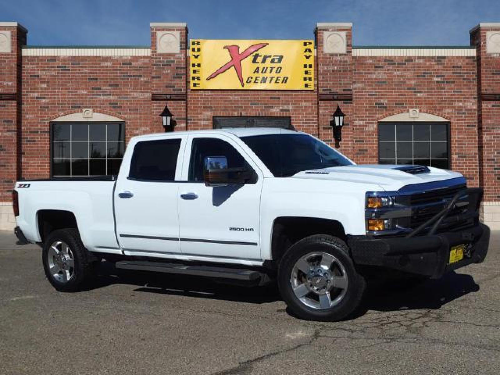 2017 Summit White Chevrolet Silverado 2500HD LTZ (1GC1KWEY7HF) with an 6.6L Duramax 6.6L Biodiesel Tu Common Rail Direct Injection engine, Allison 1000 6-Speed Shiftable Automatic transmission, located at 1401 N. Hobart, Pampa, TX, 79065, (806) 665-9872, 35.549641, -100.971878 - Photo #0