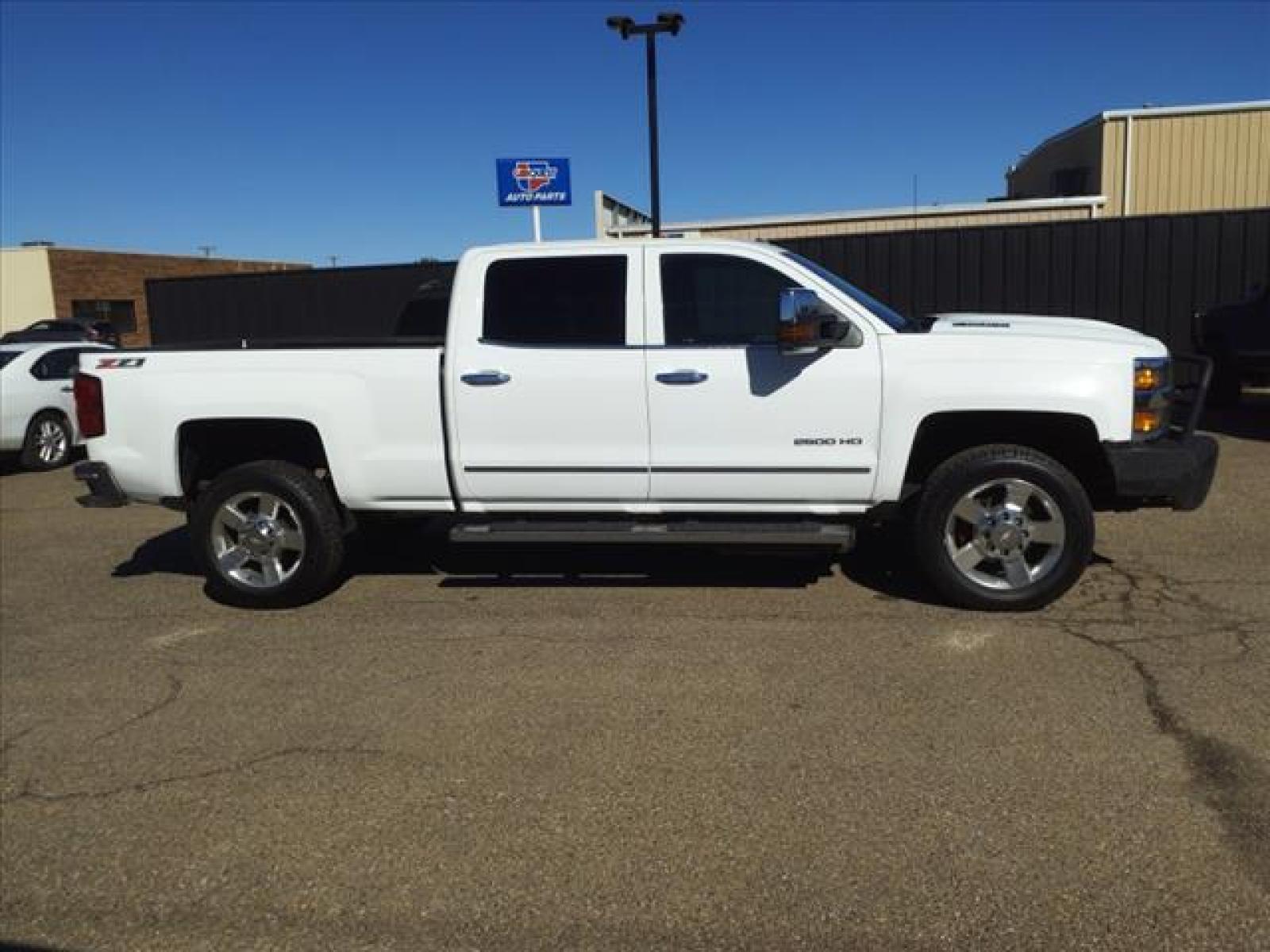 2017 Summit White Chevrolet Silverado 2500HD LTZ (1GC1KWEY7HF) with an 6.6L Duramax 6.6L Biodiesel Tu Common Rail Direct Injection engine, Allison 1000 6-Speed Shiftable Automatic transmission, located at 1401 N. Hobart, Pampa, TX, 79065, (806) 665-9872, 35.549641, -100.971878 - Photo #2