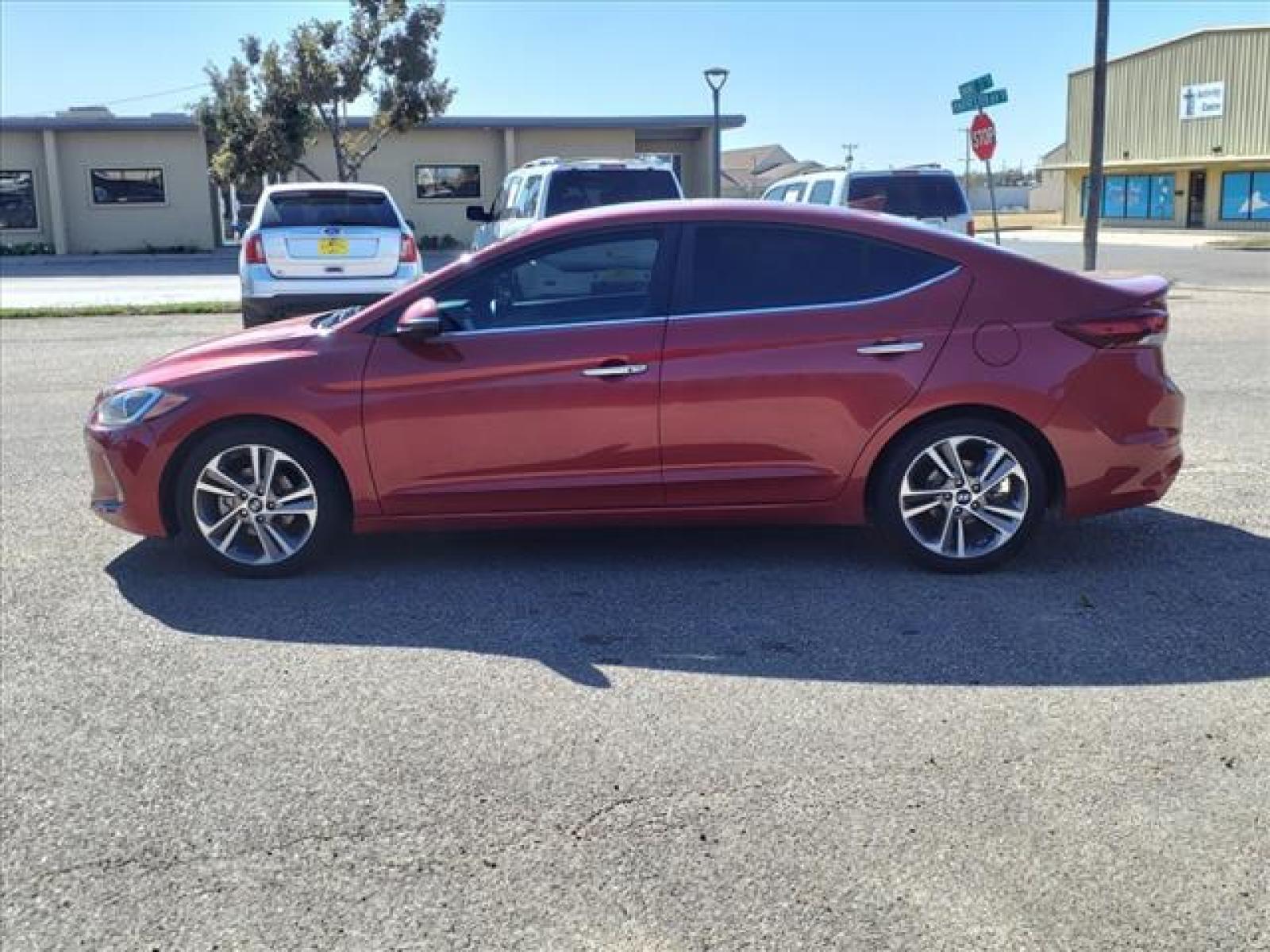 2017 Scarlet Red Hyundai ELANTRA Limited (5NPD84LF0HH) with an Nu 2.0L I4 147hp 132ft. l Sequential Multiport Fuel Injection engine, 6-Speed Shiftable Automatic transmission, located at 1401 N. Hobart, Pampa, TX, 79065, (806) 665-9872, 35.549641, -100.971878 - Photo #4