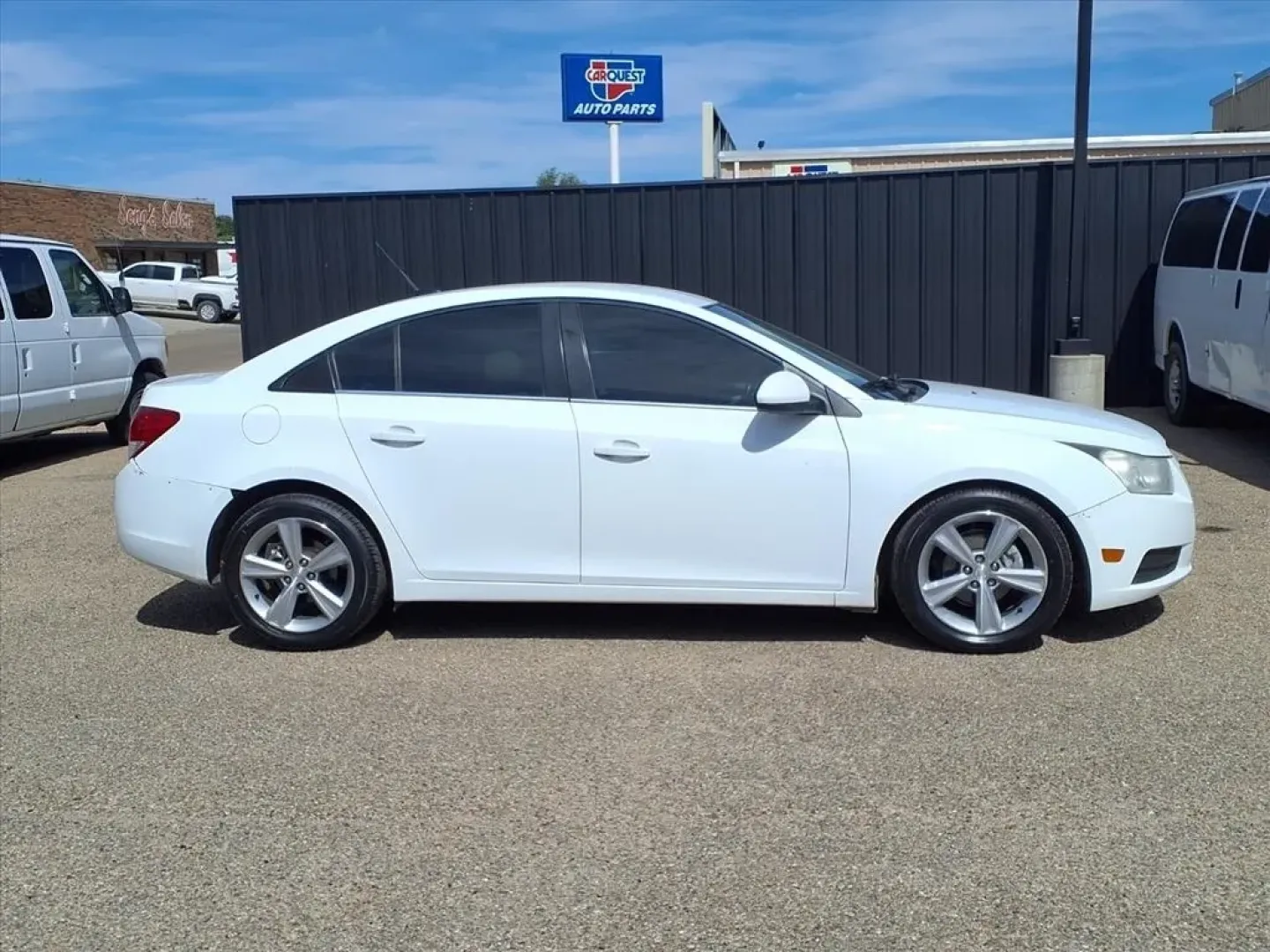 2014 Summit White Chevrolet Cruze 2LT Auto (1G1PE5SB1E7) with an Other engine, located at 1401 N. Hobart, Pampa, TX, 79065, (806) 665-9872, 35.549953, -100.975098 - Discover the perfect blend of comfort, efficiency, and style with our 2014 Chevrolet Cruze 2LT, available now at Xtra Auto Center in Pampa, TX. This sedan is ideal for budget-conscious buyers who require a reliable vehicle for long commutes and weekend adventures. With its impressive fuel efficiency - Photo#2